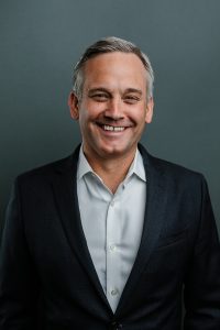 A studio headshot of a San Francisco based financial advisor that works for First Republic Bank