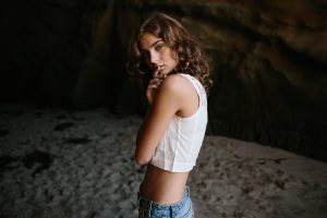 Edgy portrait of model Maddison Brinnon at 1000 steps beach in Laguna Beach California
